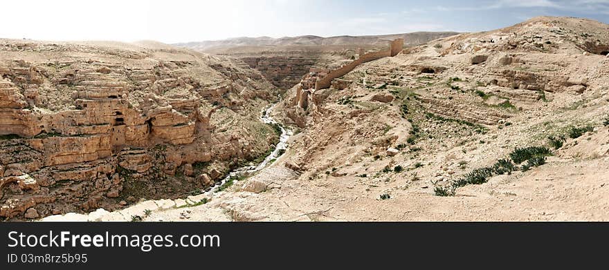 Travel at spring in judean desert for hermits caves and monk monastery