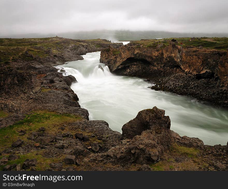 The Godafoss is one of the most spectacular waterfalls in Iceland. It is located in the Mývatn district of North-Central Iceland at the beginning of the Sprengisandur highland road. The water of the river Skjálfandafljót falls from a height of 12 meters over a width of 30 meters. The Godafoss is one of the most spectacular waterfalls in Iceland. It is located in the Mývatn district of North-Central Iceland at the beginning of the Sprengisandur highland road. The water of the river Skjálfandafljót falls from a height of 12 meters over a width of 30 meters