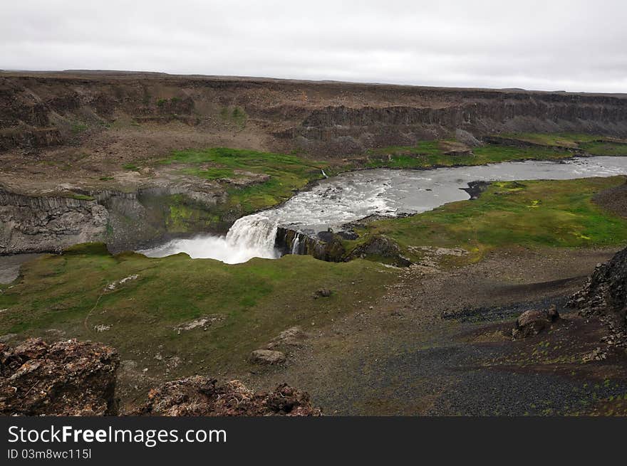 Hafragilsfoss waterfall in Iceland. The waterfall flows downstream from Dettifoss within the depths of the Jökulságljúfur canyon