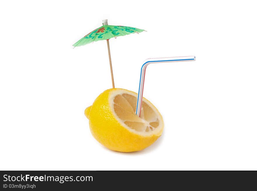 Cocktail with lemon with straw and umbrella on a white background