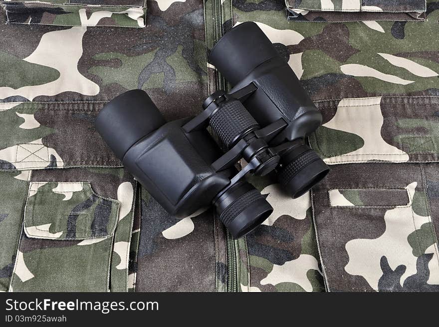 A binocular, photographed in a studio. A binocular, photographed in a studio.