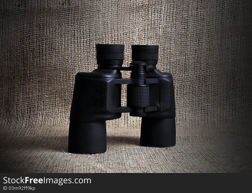 A binocular, photographed in a studio. A binocular, photographed in a studio.