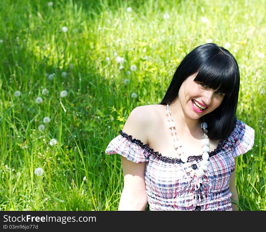 Beautiful smiling woman at the park. Beautiful smiling woman at the park