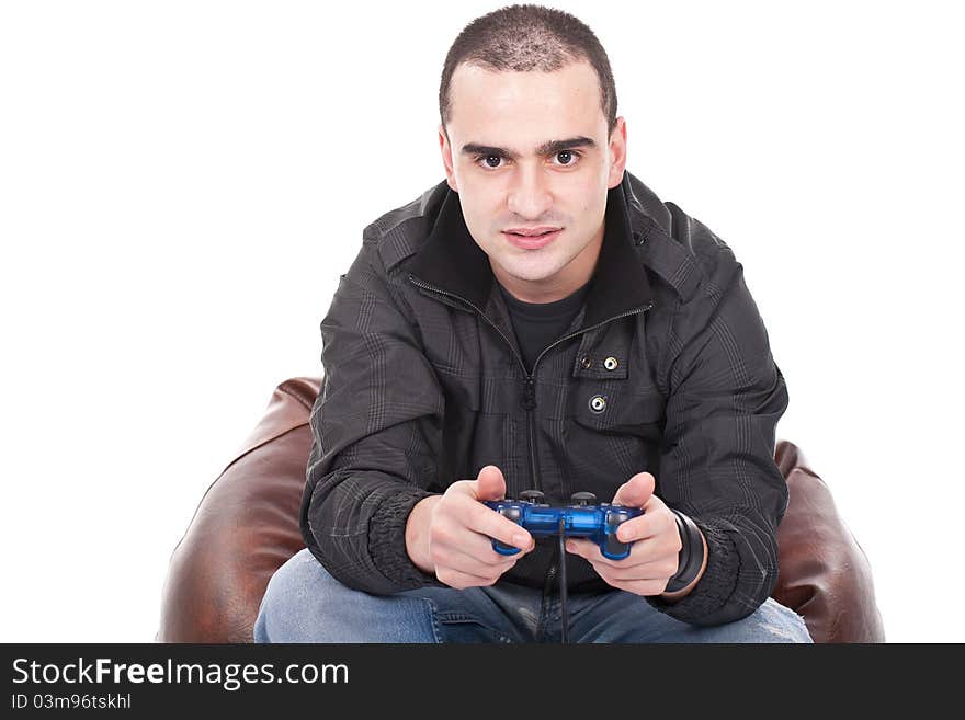 Young man with a joystick for game console