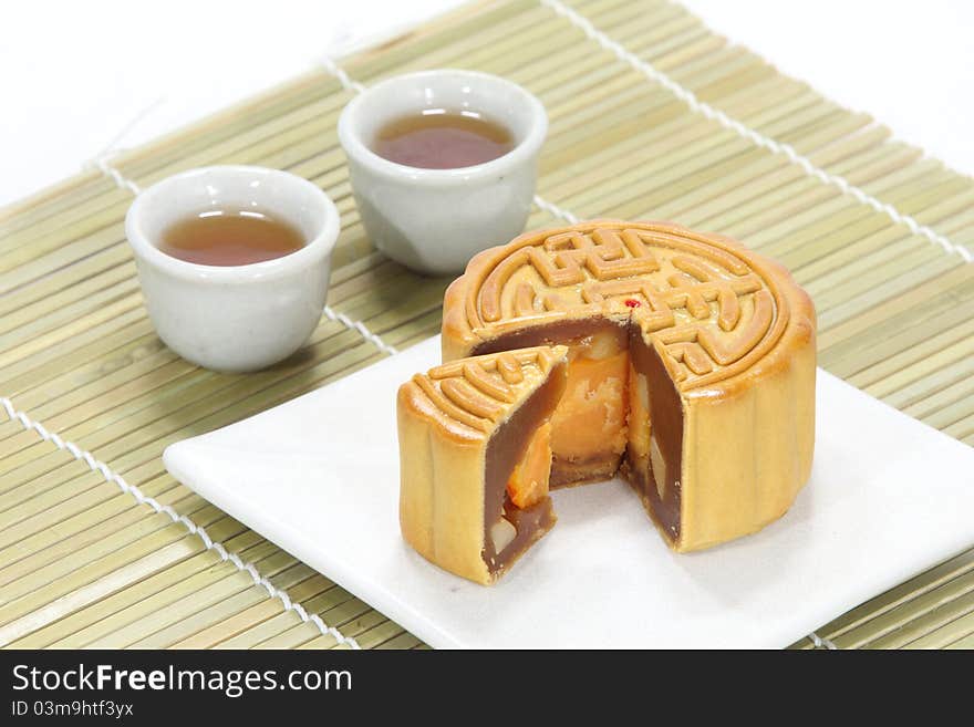 Moon cake with tea on bamboo