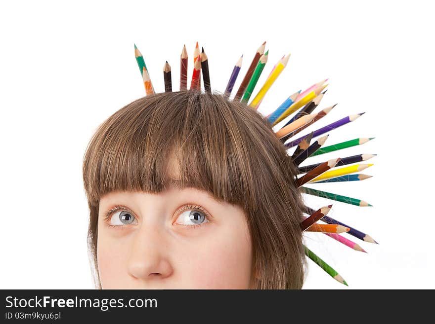 Girl with pencils isolated on a white background