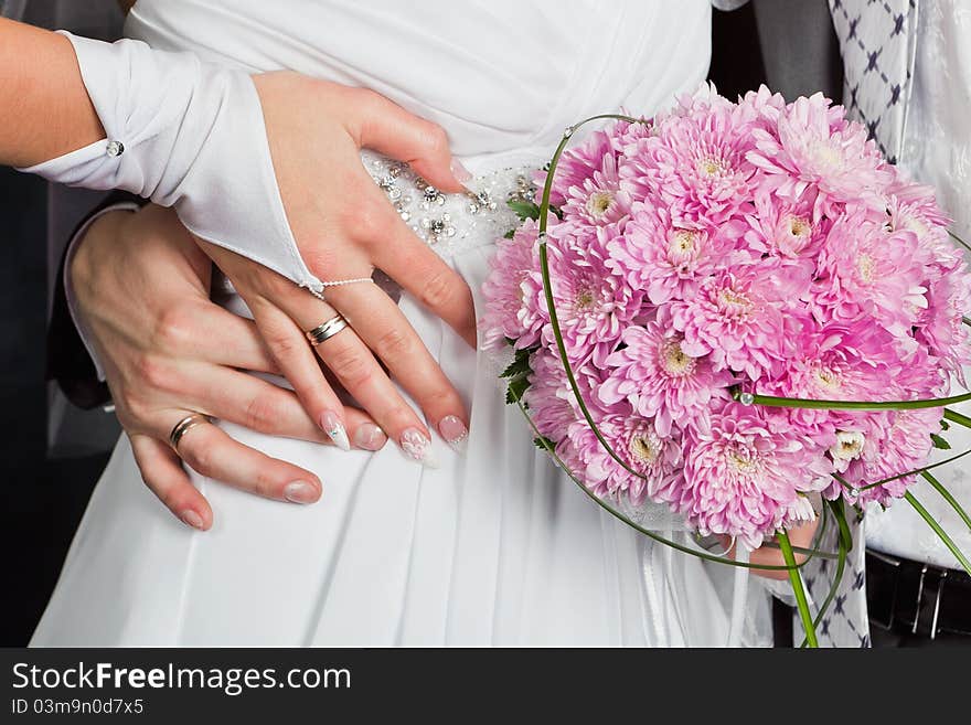 Bride and groom hands