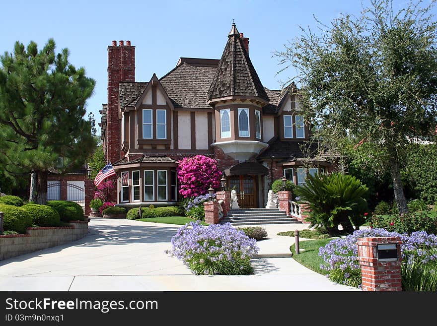 Beautiful house with a driveway and US Flag. Beautiful house with a driveway and US Flag