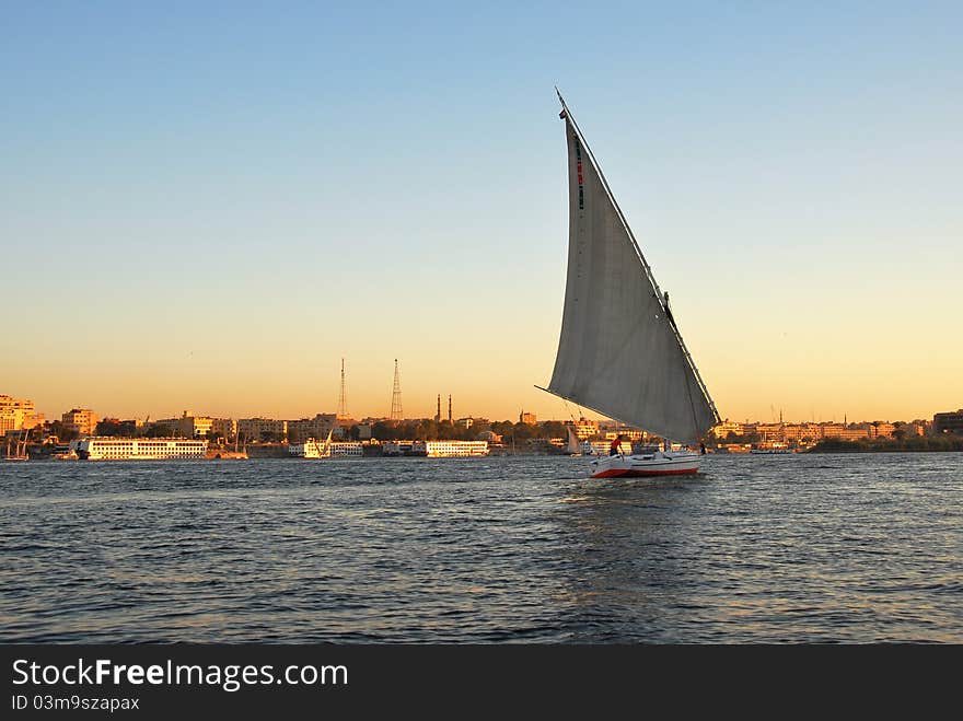 Felucca, a traditional wooden sailing boat on Nile River. Felucca, a traditional wooden sailing boat on Nile River