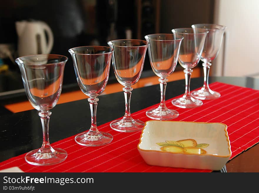 Six glasses for wine on a table