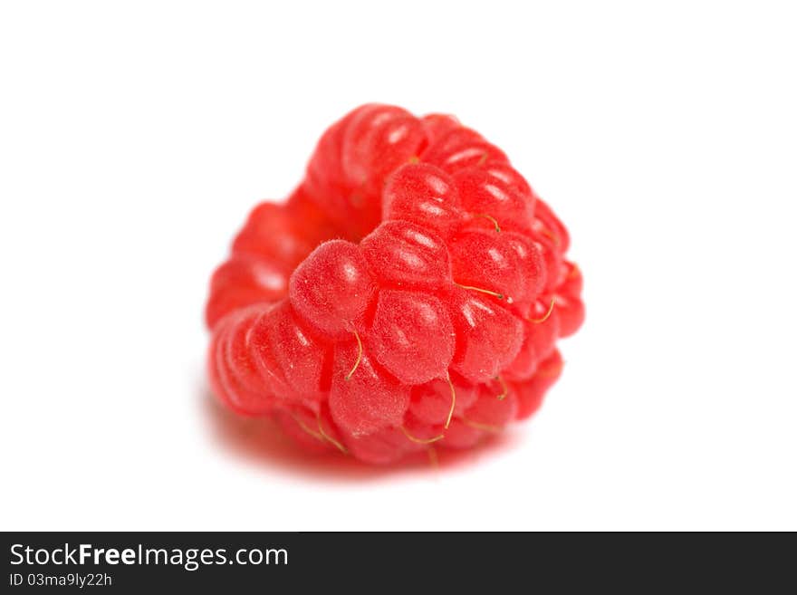 Closeup ripe raspberry isolated over white