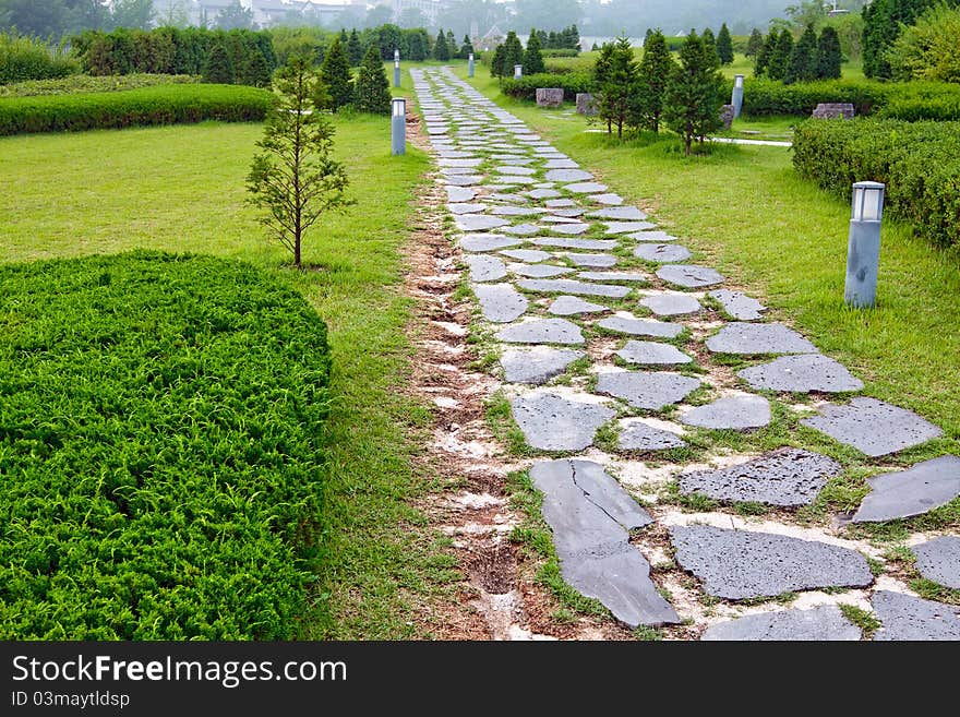 Garden path paved with a natural stone