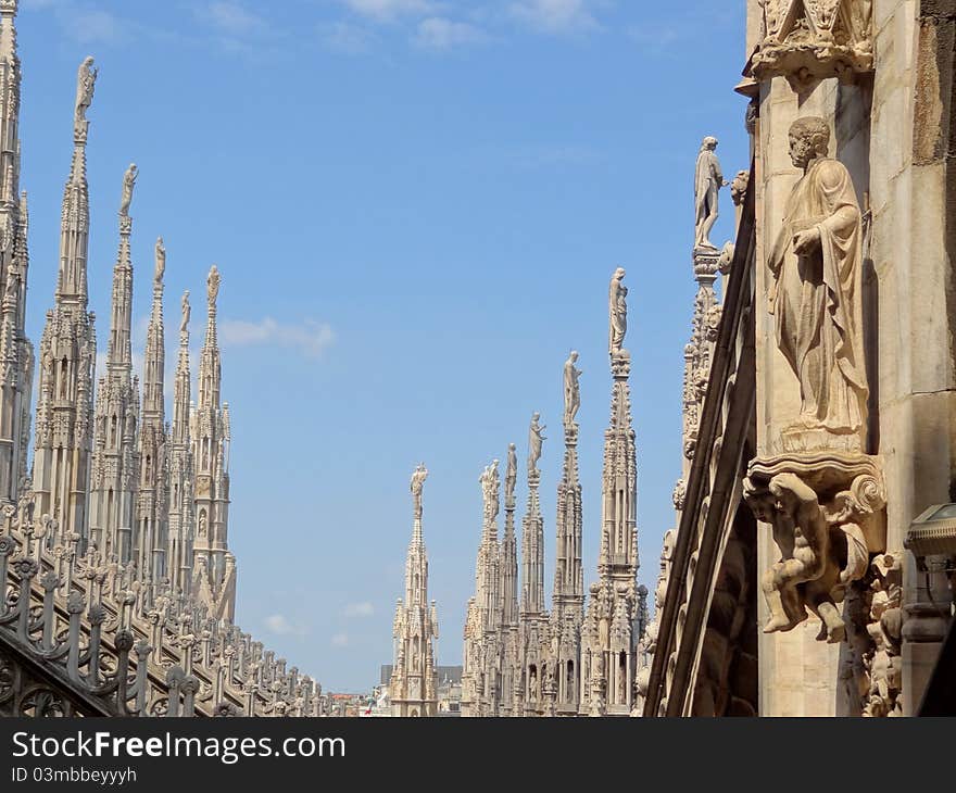 Milan's dome, the most famous monument of the city. The roof is a forest of white statues. Milan's dome, the most famous monument of the city. The roof is a forest of white statues.