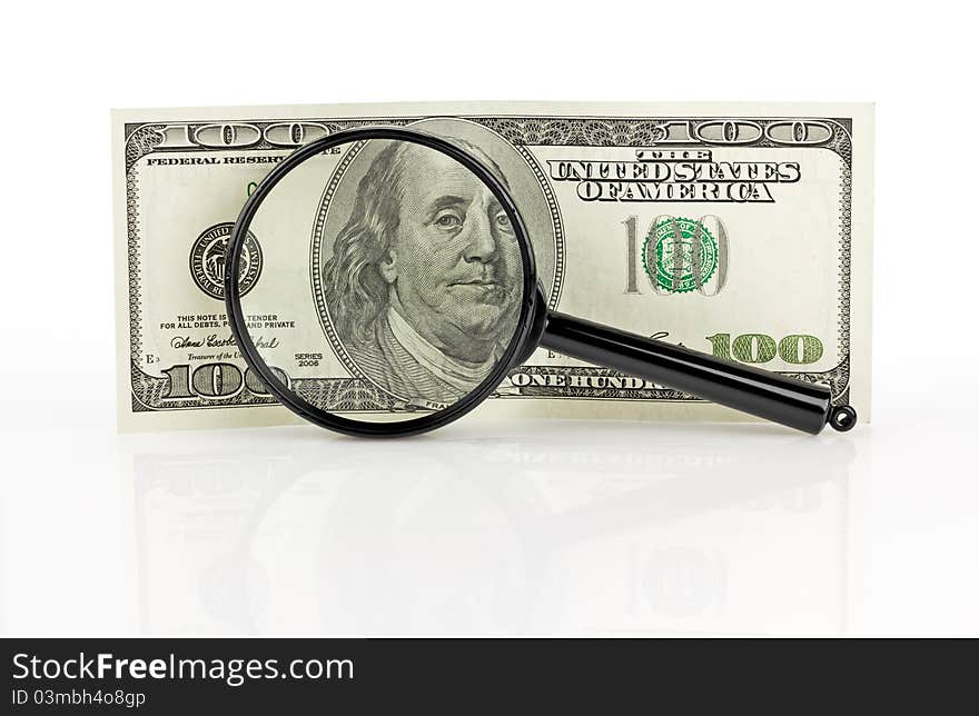 Dollars And Magnifying Lens