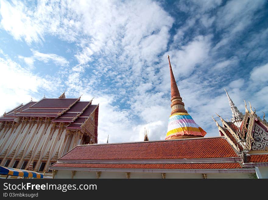 This is the wide scence of Wat That temple, Khonkaen, Thailand. The pagoda and the buddha image hall are very huge. This is the wide scence of Wat That temple, Khonkaen, Thailand. The pagoda and the buddha image hall are very huge.