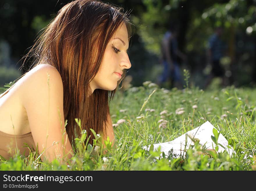 The image of a reading girl