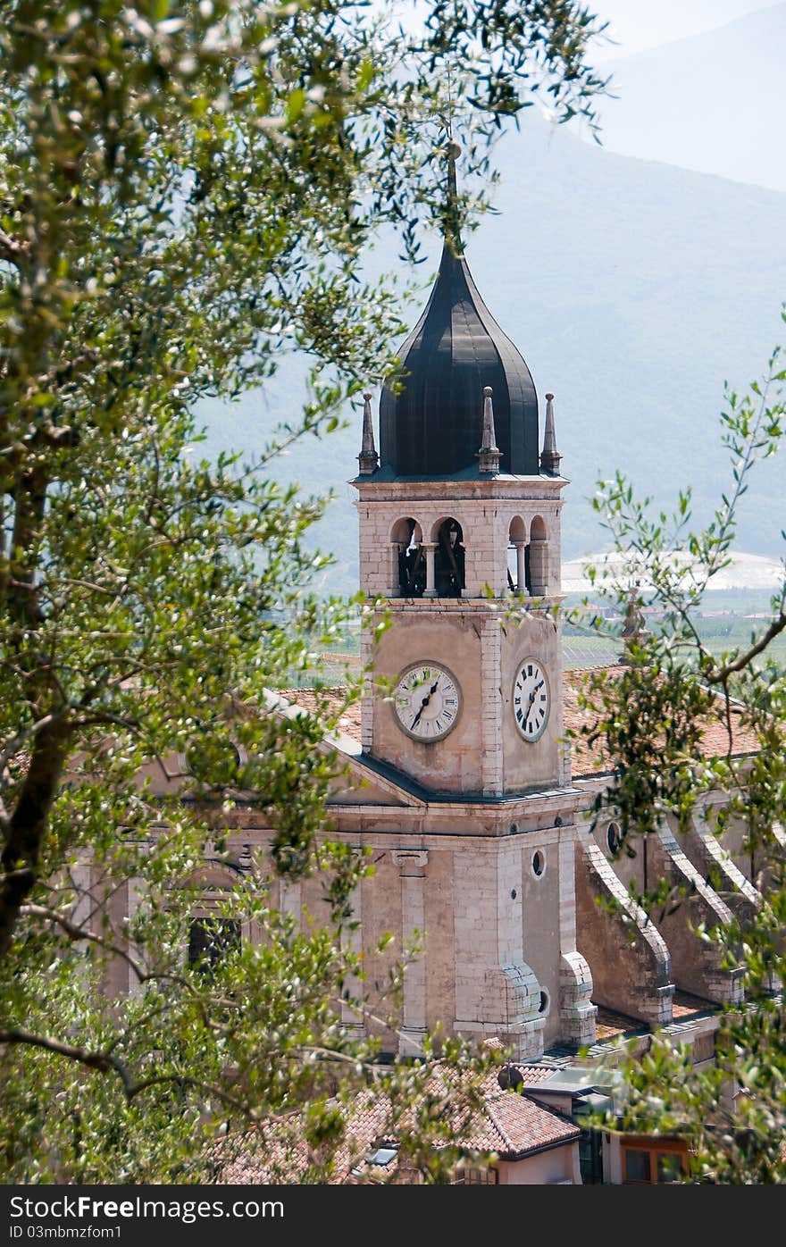 The old church's bell tower with clocks of Arco - Trentino / Italy. The old church's bell tower with clocks of Arco - Trentino / Italy