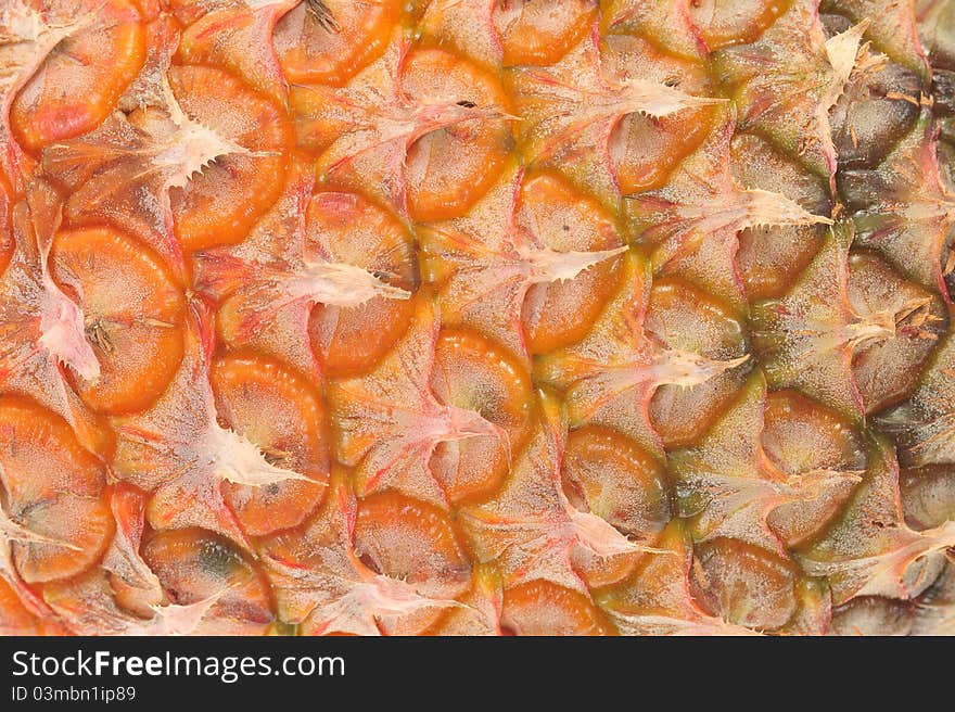 Closeup Showing The Skin Texture Of A Pineapple Fruit. Closeup Showing The Skin Texture Of A Pineapple Fruit