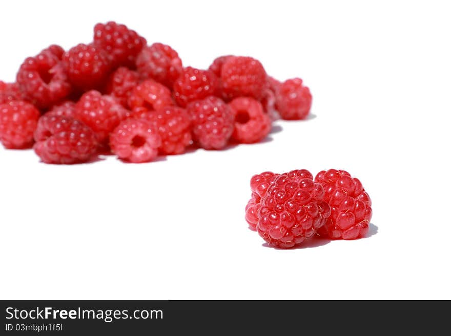 Fresh, juicy and healthy raspberries, red on white. Fresh, juicy and healthy raspberries, red on white