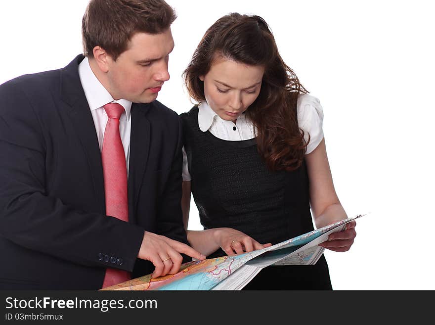 Closeup of a happy casual couple with map isolated on the white