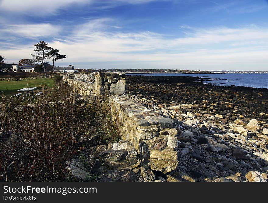 A rock wall built beside the ocean