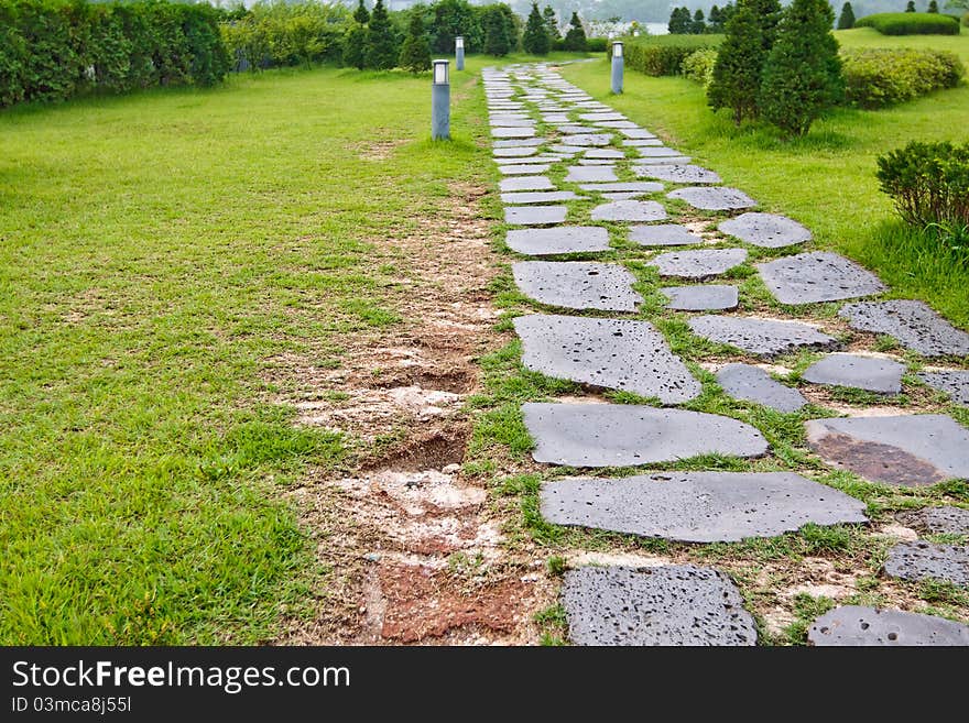 Garden path paved with a natural stone