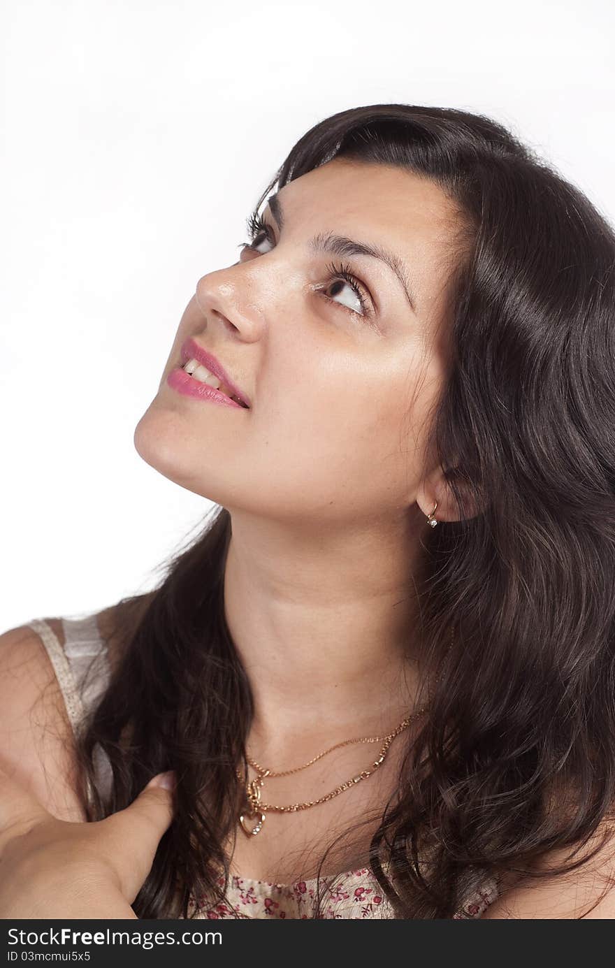 Young  cute woman posing on a white. Young  cute woman posing on a white