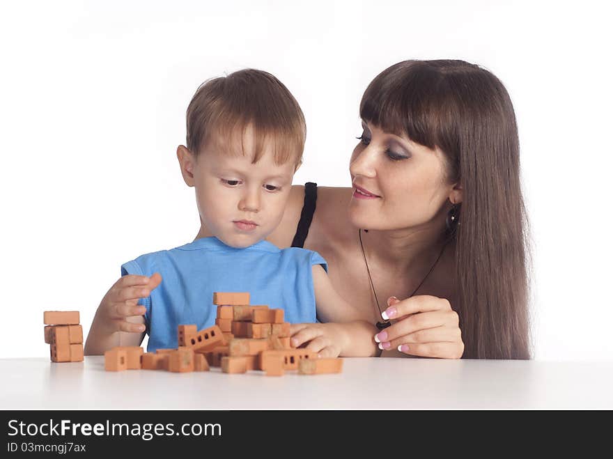 Mom and son constructing