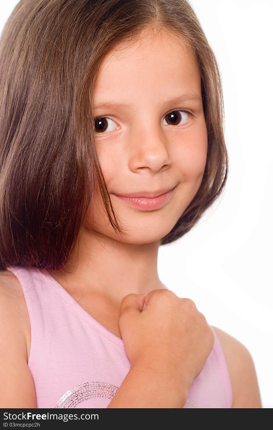 Happy little girl posing on a white. Happy little girl posing on a white