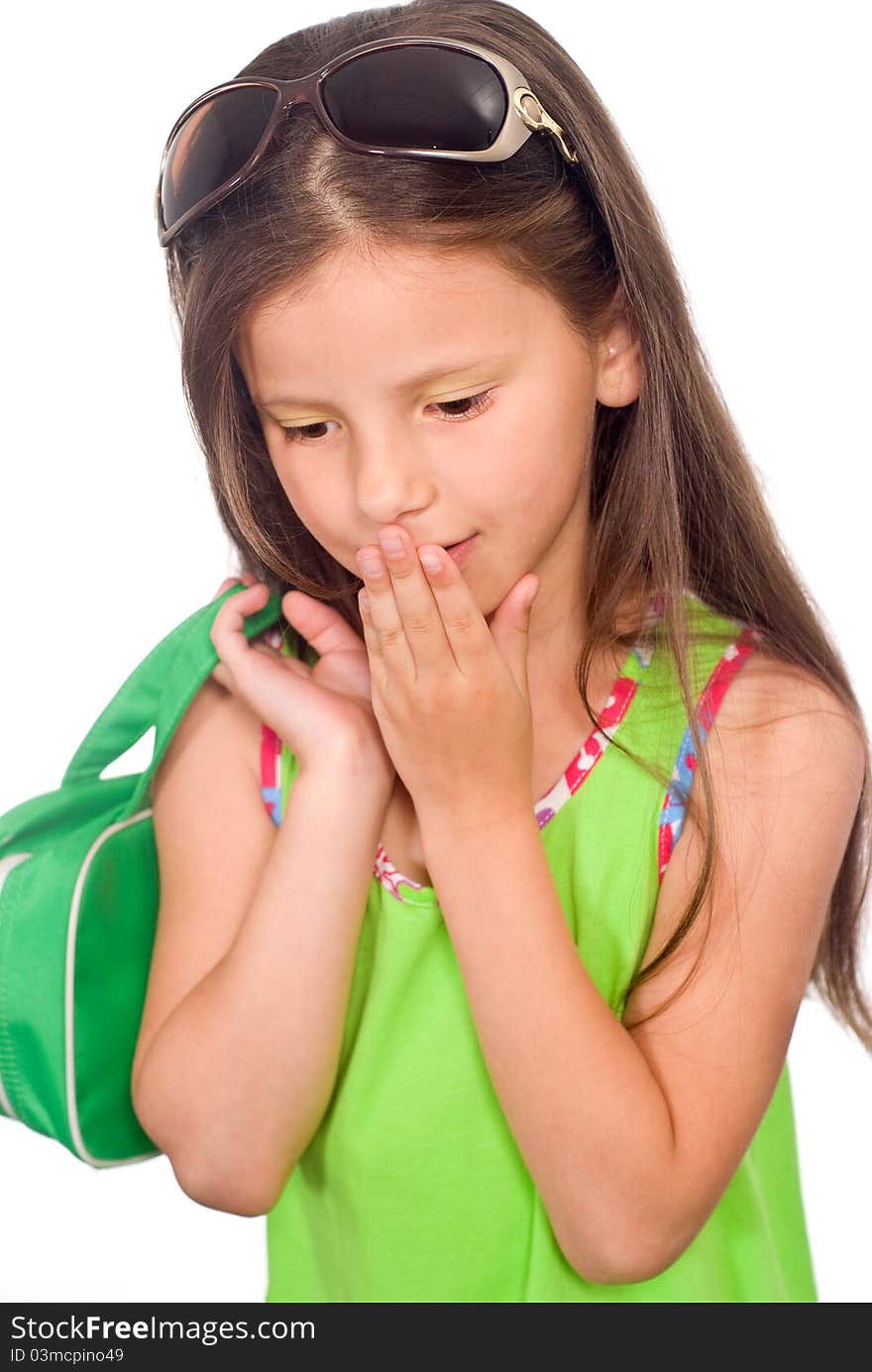 Portrait of a little girl in green clothes