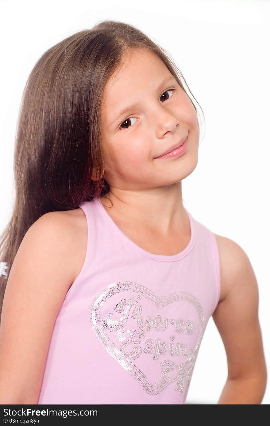 Happy little girl posing on a white. Happy little girl posing on a white