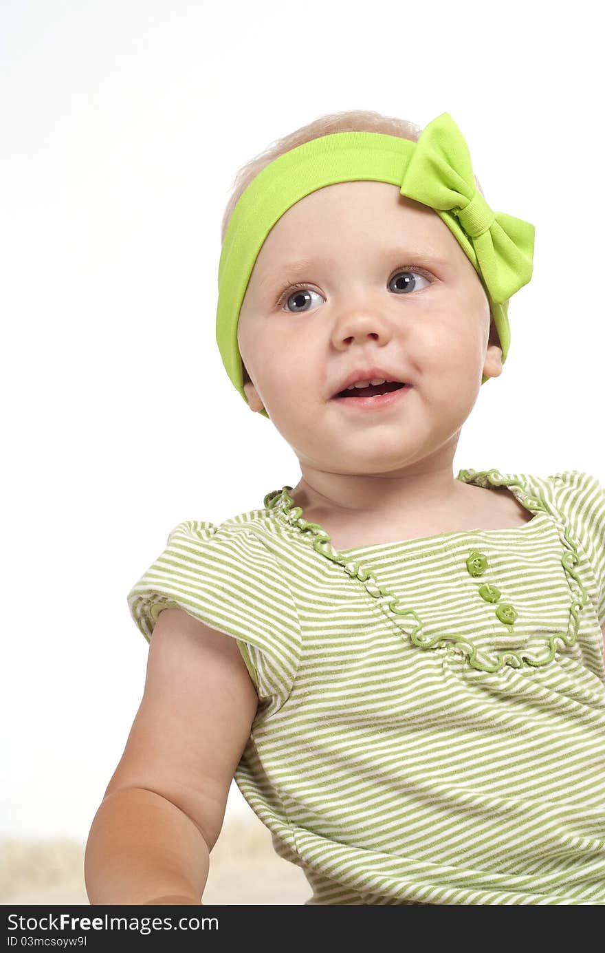 Portrait of a happy little girl on white