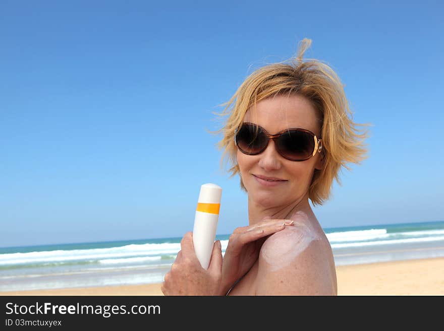 Blond woman at the beach. Blond woman at the beach