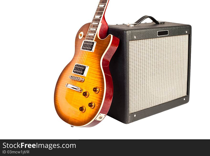 Guitar and amplifier (isolated on white)