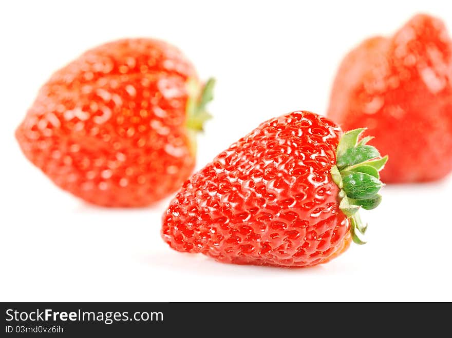 Fresh and tasty strawberries with white background.