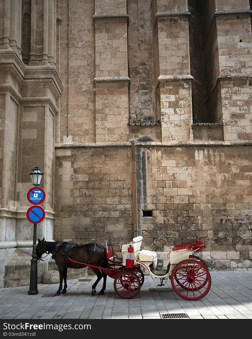 Horse carriage stop outside Palma de Majorca town Cathedral in Spain. Horse carriage stop outside Palma de Majorca town Cathedral in Spain.