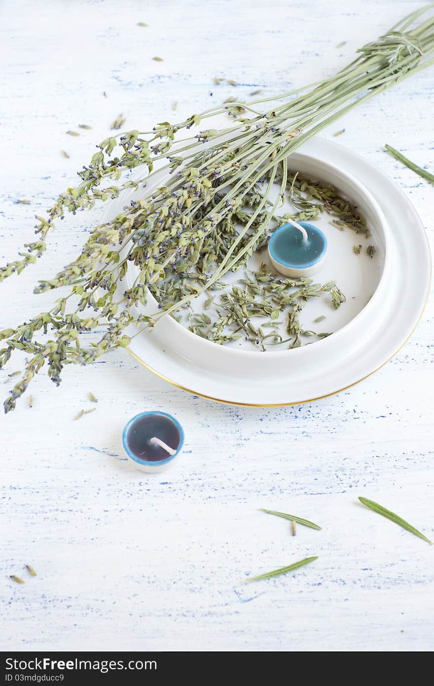 Composition with dried lavender and candles