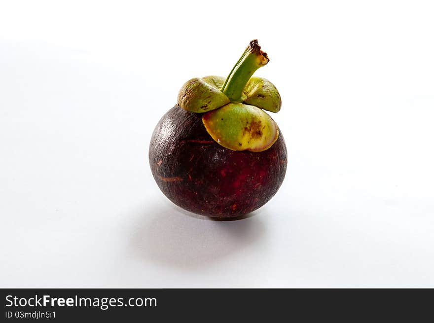 Mangosteen on white background at bangkok