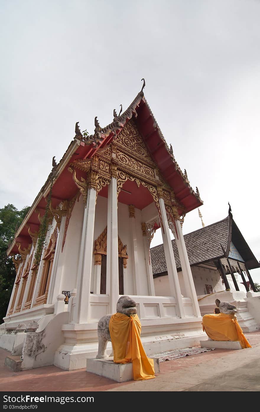 A Buddha image hall of Kham Kaen Temple, Thailand which is the landmark of Khonkaen Province. This picture was capture during rainy season, so the sky is so dull. A Buddha image hall of Kham Kaen Temple, Thailand which is the landmark of Khonkaen Province. This picture was capture during rainy season, so the sky is so dull.