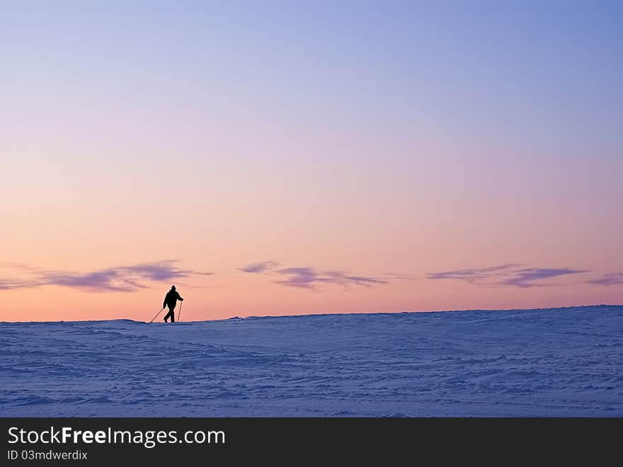 Skier At Sunset