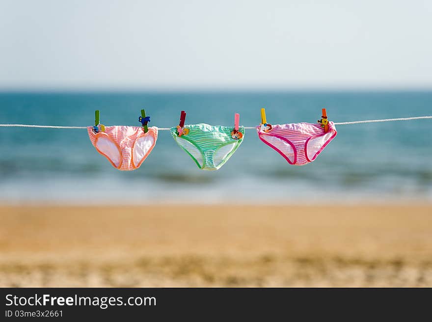 Swimming wear are drying on the ocean. Swimming wear are drying on the ocean