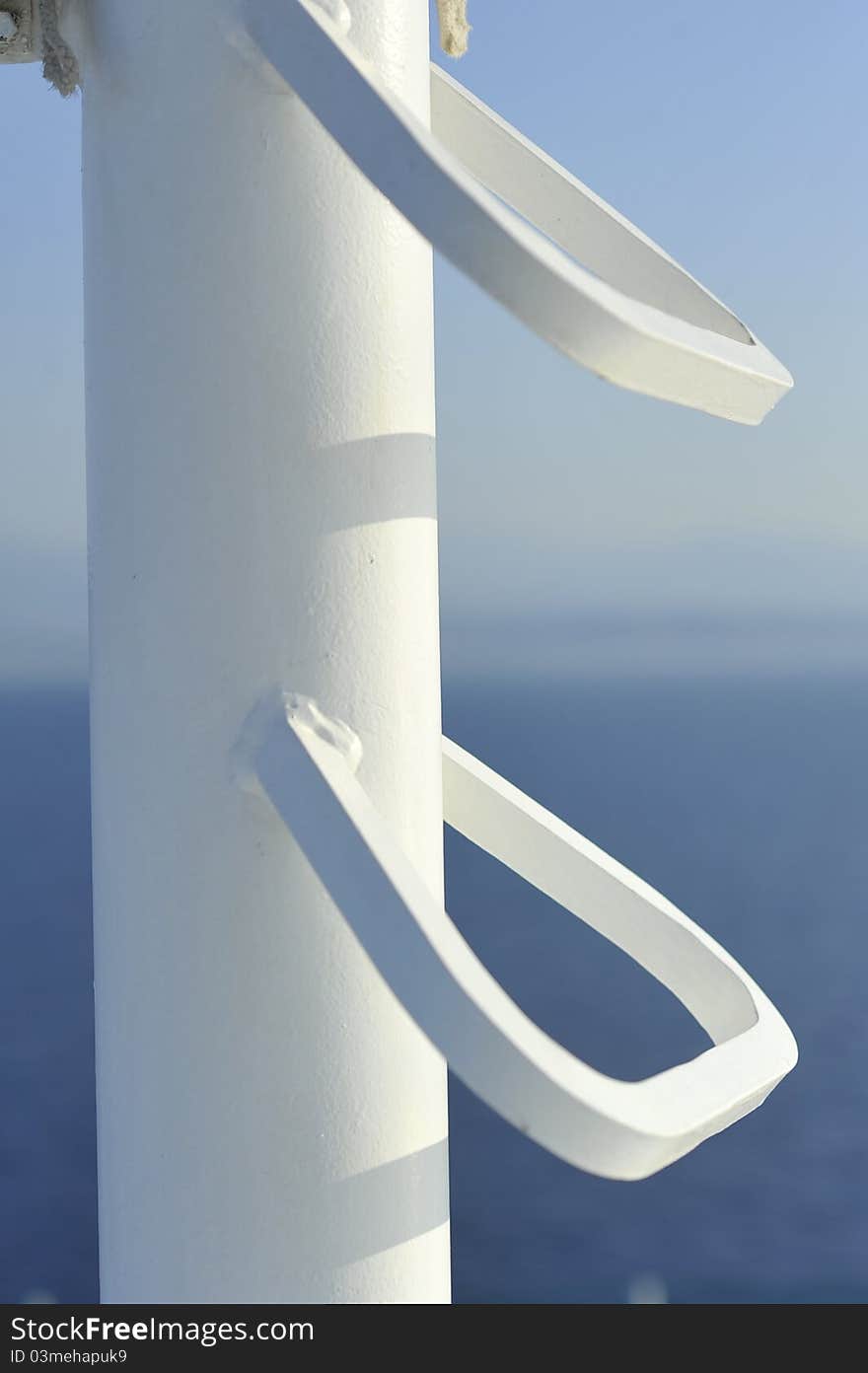 A View of the side of a ship in the morning light picturing steel details. A View of the side of a ship in the morning light picturing steel details