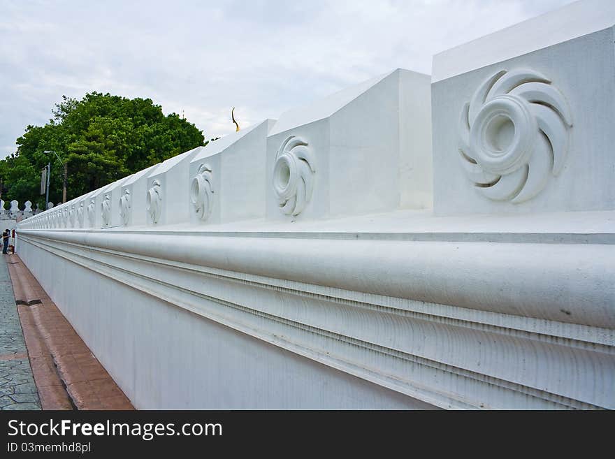 Perspective view of white wall Design in Wat Thai in Bangkok