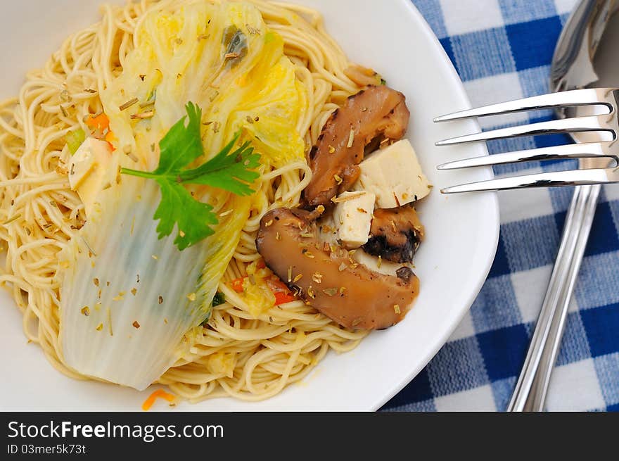 Healthy and nutritious mushroom noodles cooked Chinese style. Healthy and nutritious mushroom noodles cooked Chinese style.