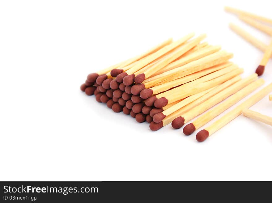 Pile of matches on white background.