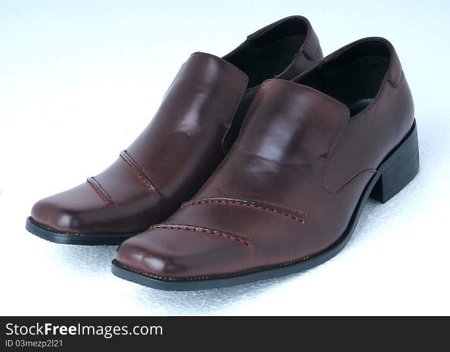 Man's leather shoes photoed in the studio with white background. Man's leather shoes photoed in the studio with white background.