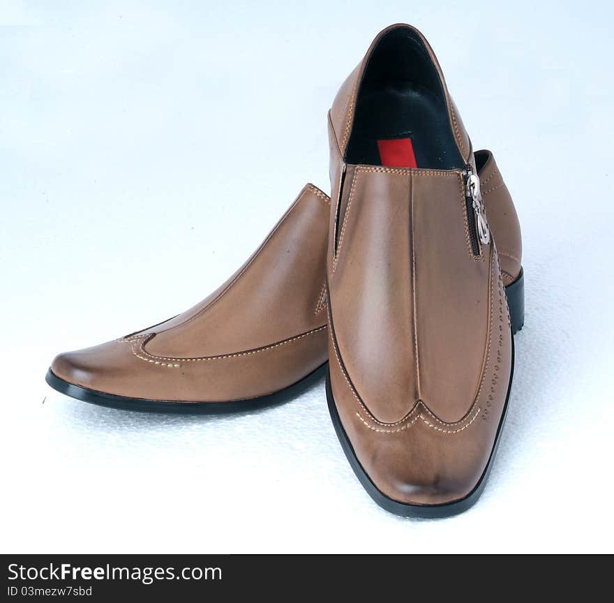 Man's leather shoes photoed in the studio with white background. Man's leather shoes photoed in the studio with white background.