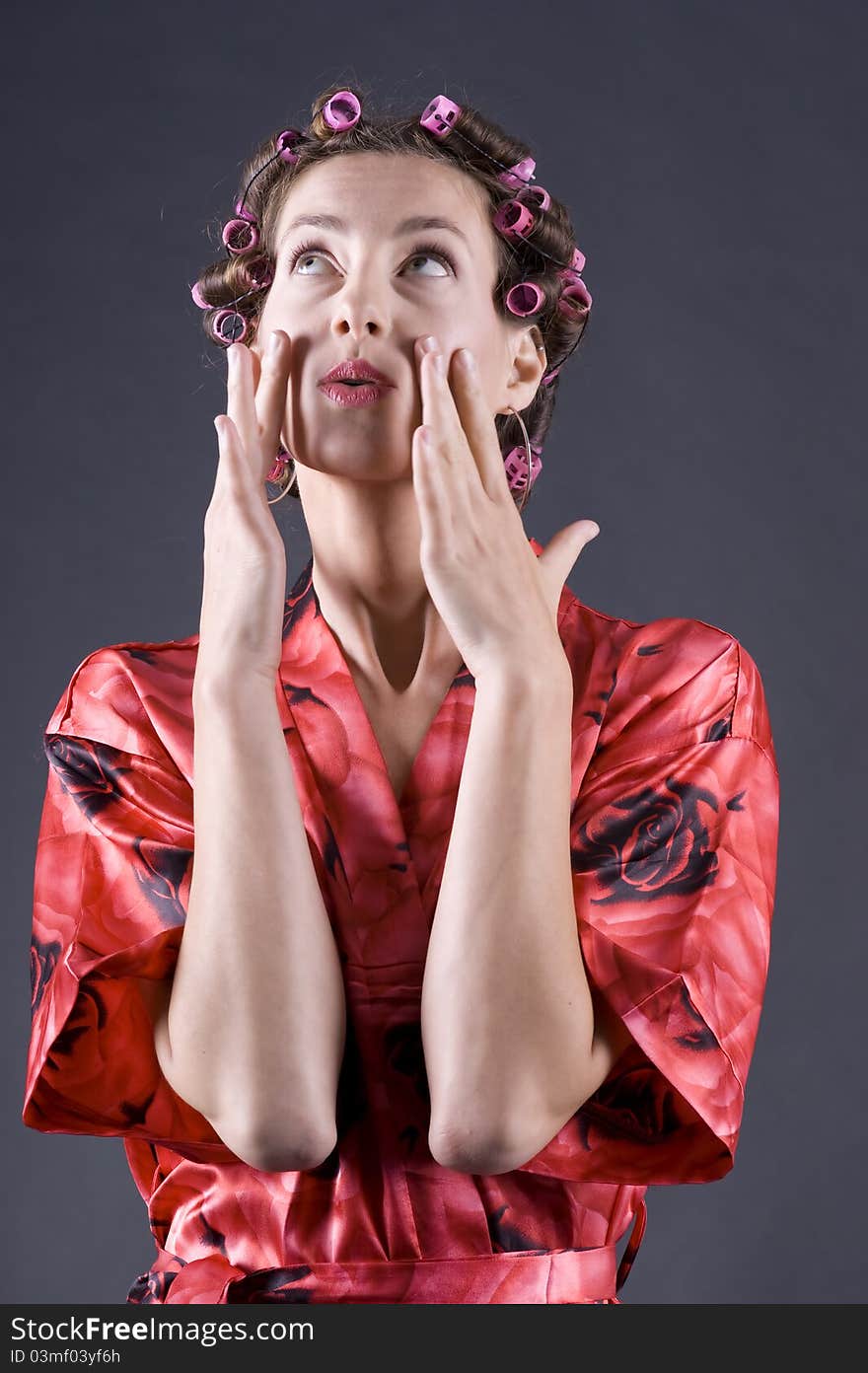 Beautiful Young Woman With Bigoudi On The Hair