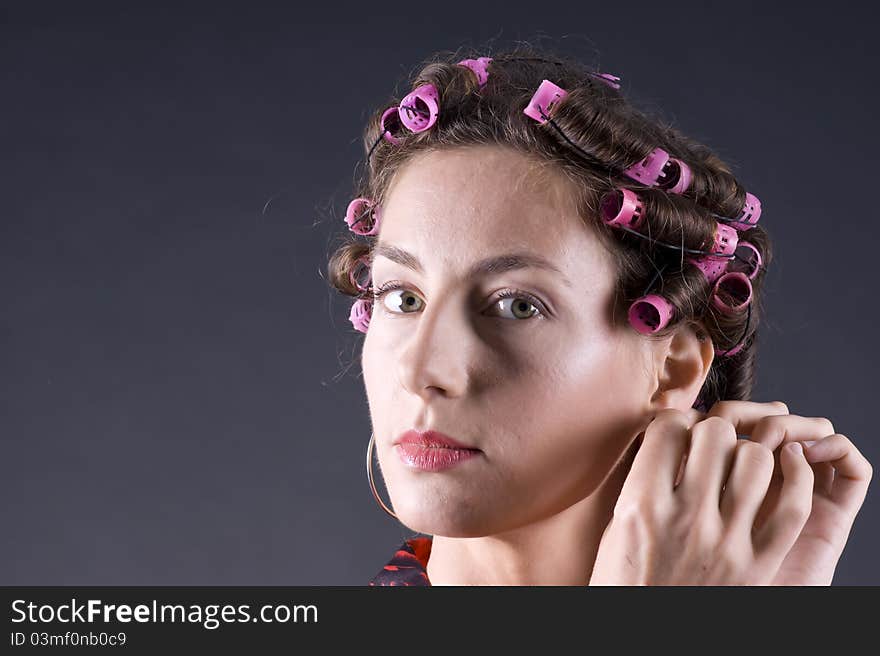 Beautiful Young Woman With Bigoudi On The Hair