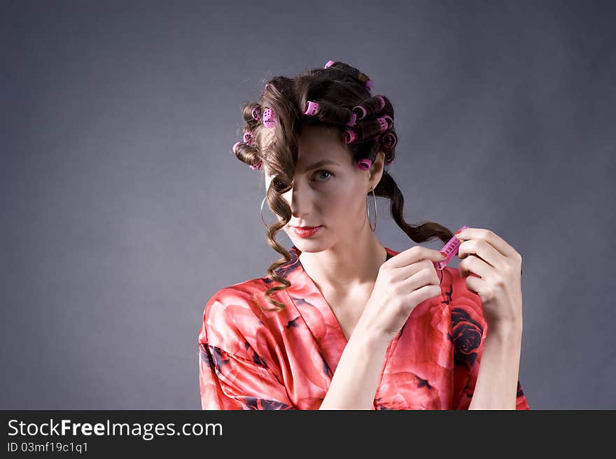 Beautiful Young Woman With Bigoudi On The Hair